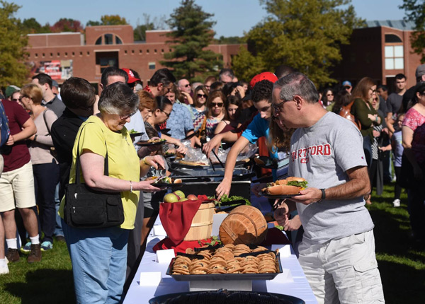 Groups of parents and student at a cookout