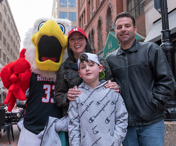 a family at Day of Giving kick off event