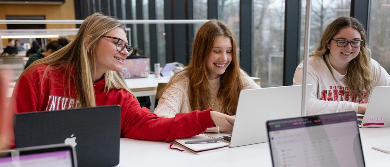 Students studying in the library.