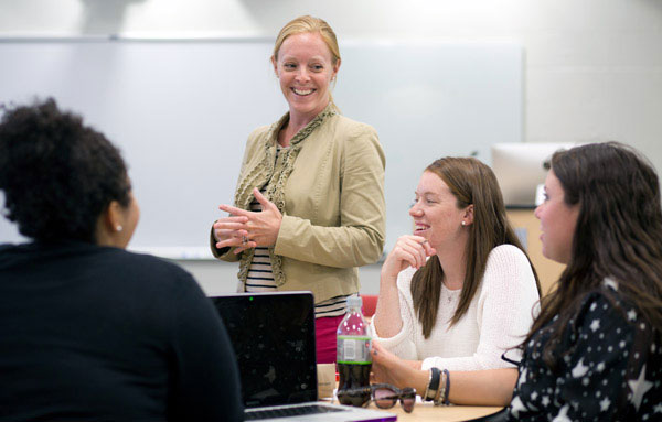 Faculty and students in classroom