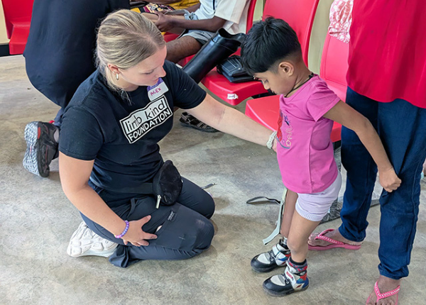 prosthetics students with pediatric patient