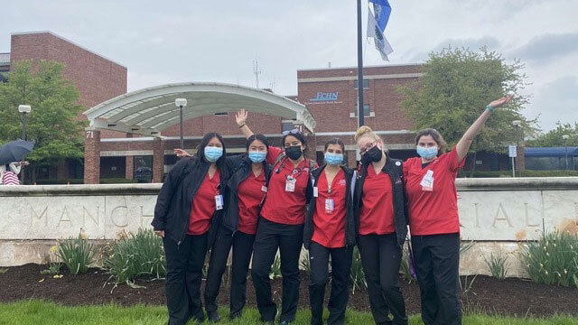nursing students in front of hospital