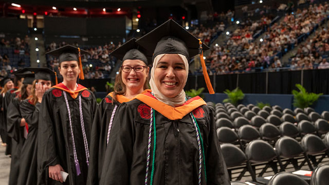Graduate student at commencement