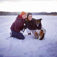 Lang with her wife Mel and dog Cooper