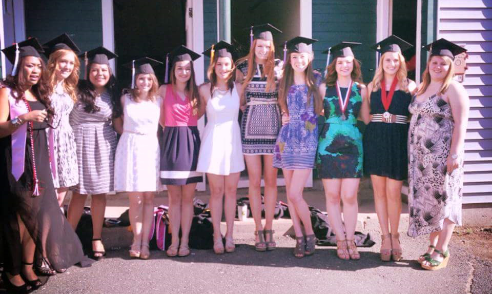 Audycki posing with her friends at graduation