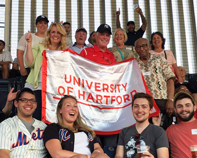 Bligh holding a UHart banner