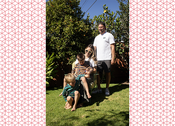 Brett Seeman posing with his family