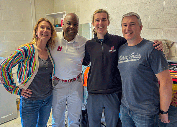 President Ward with a UHart family at move in