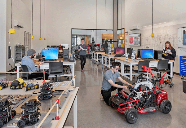 students working in the robotics lab in Hursey Center