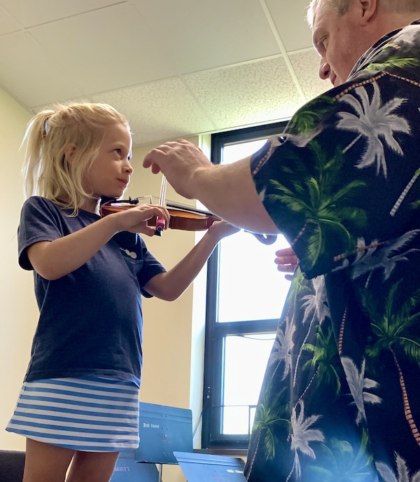 Suzuki student with instructor