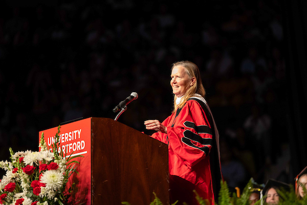 Kathy Behrens at podium