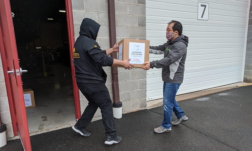 two men with box