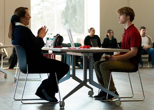 Student being interviewed at the Allan Career Center's Mock Interview Day