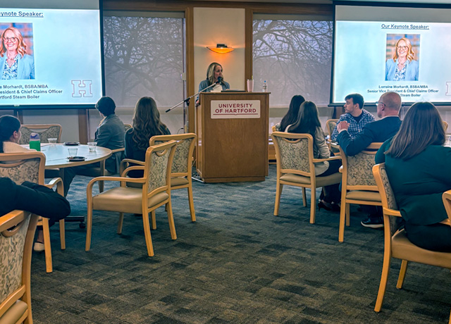 keynote speaker at podium