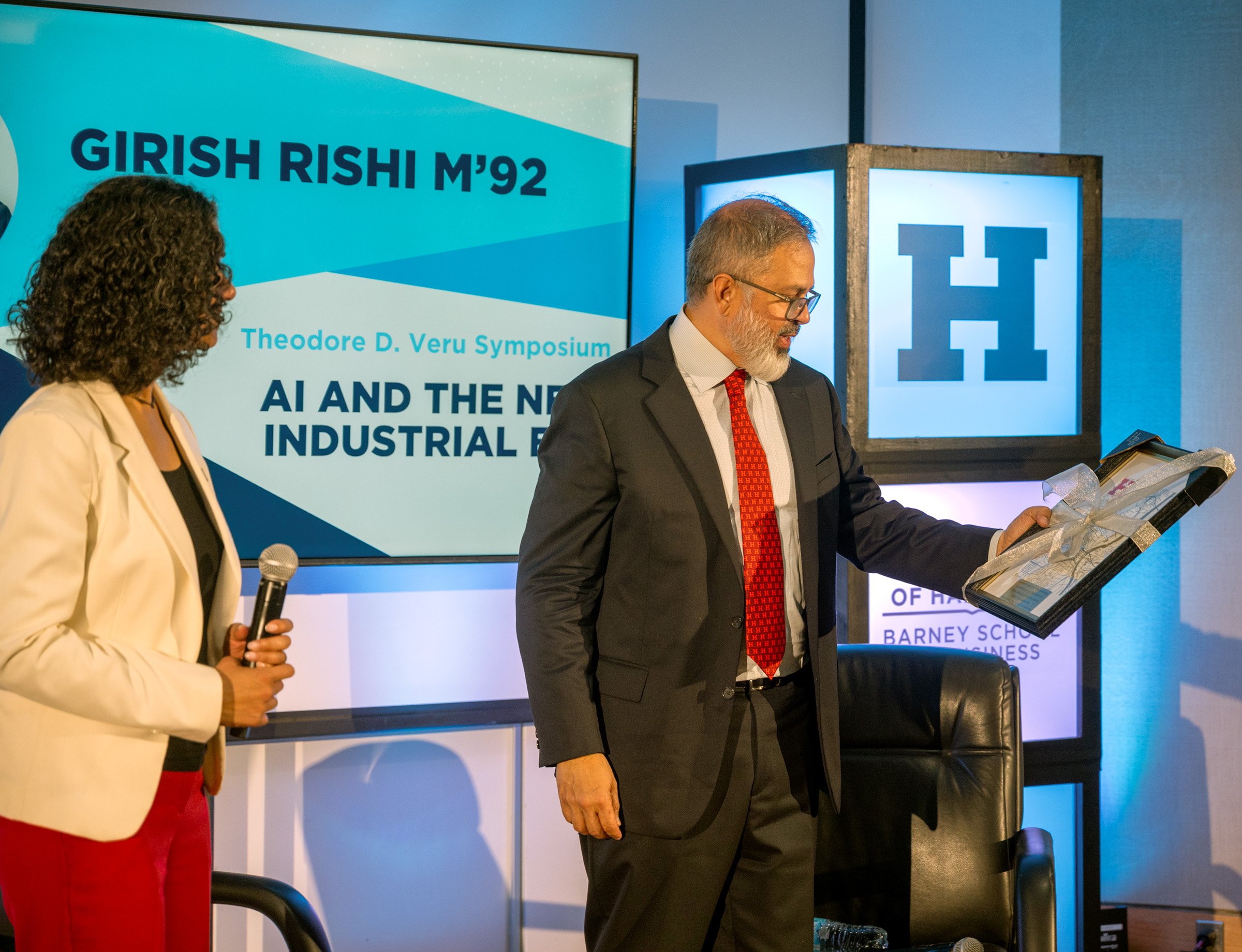 man receiving plaque