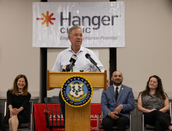 Lamont speaking at event
