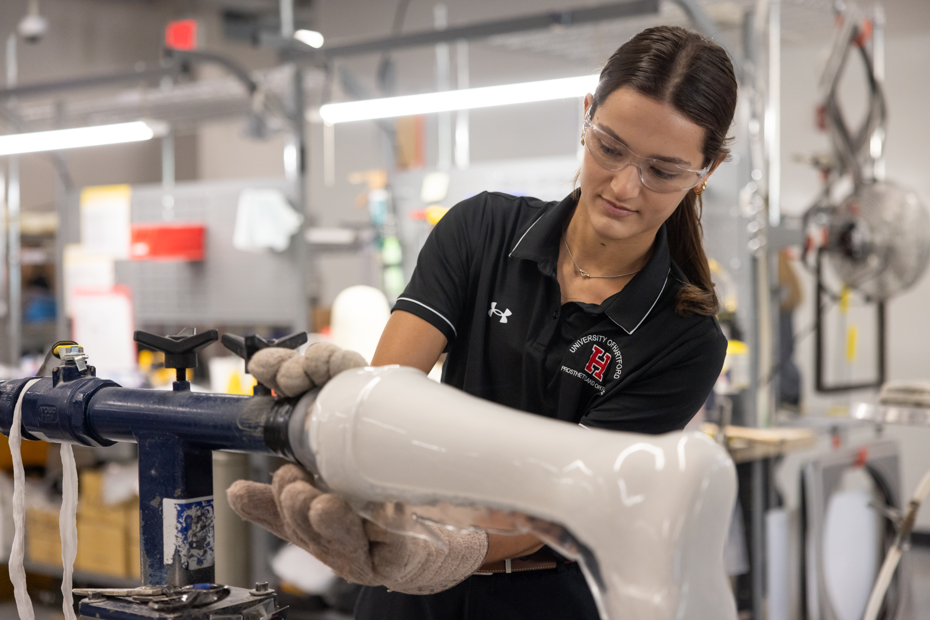 student fabricating a prosthetic leg