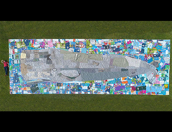 Professor Kat Owens with a piece from her Entangled and Ingested series