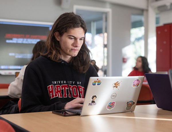 UHart student on a computer