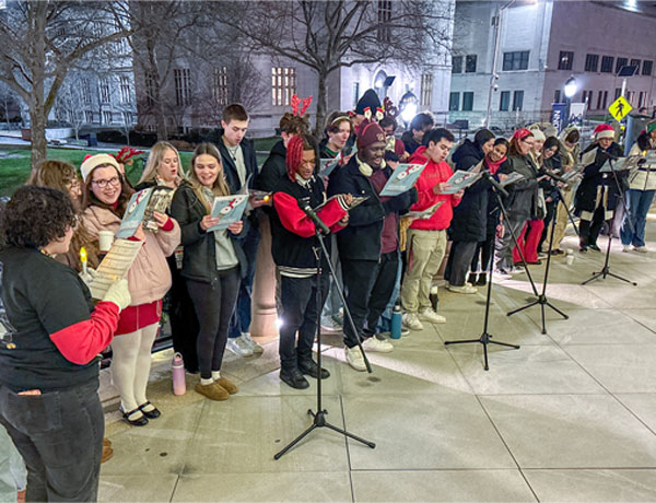 UHart students caroling