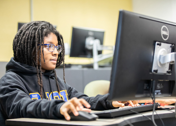 student working on a computer