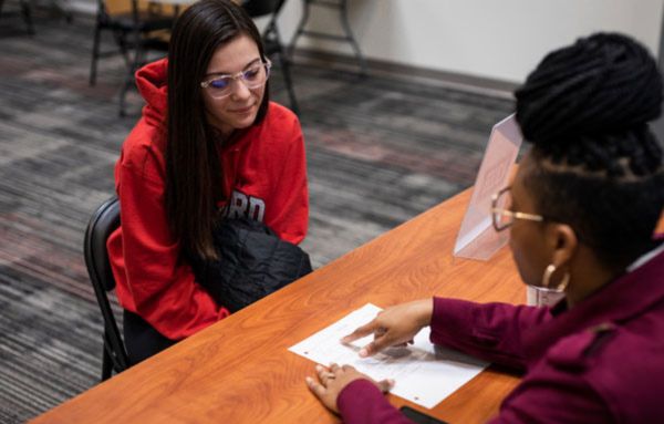 employer reviewing students resume