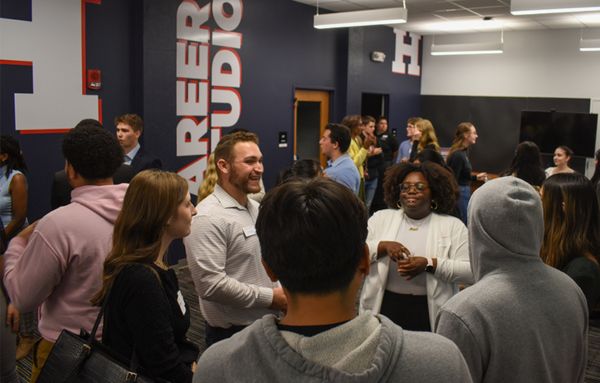 UHart students networking at a Career Studio event.