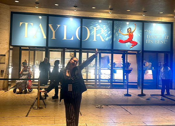 Sabrina in front of Paul Taylor Dance Company sign