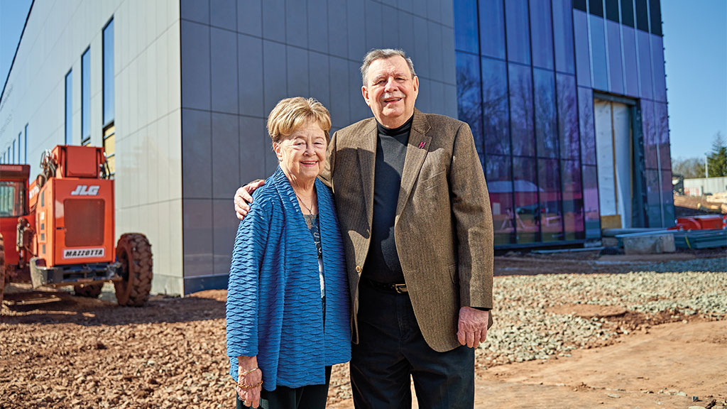 photo of Nancy and Frank Hursey in front of the Hursey Center building.