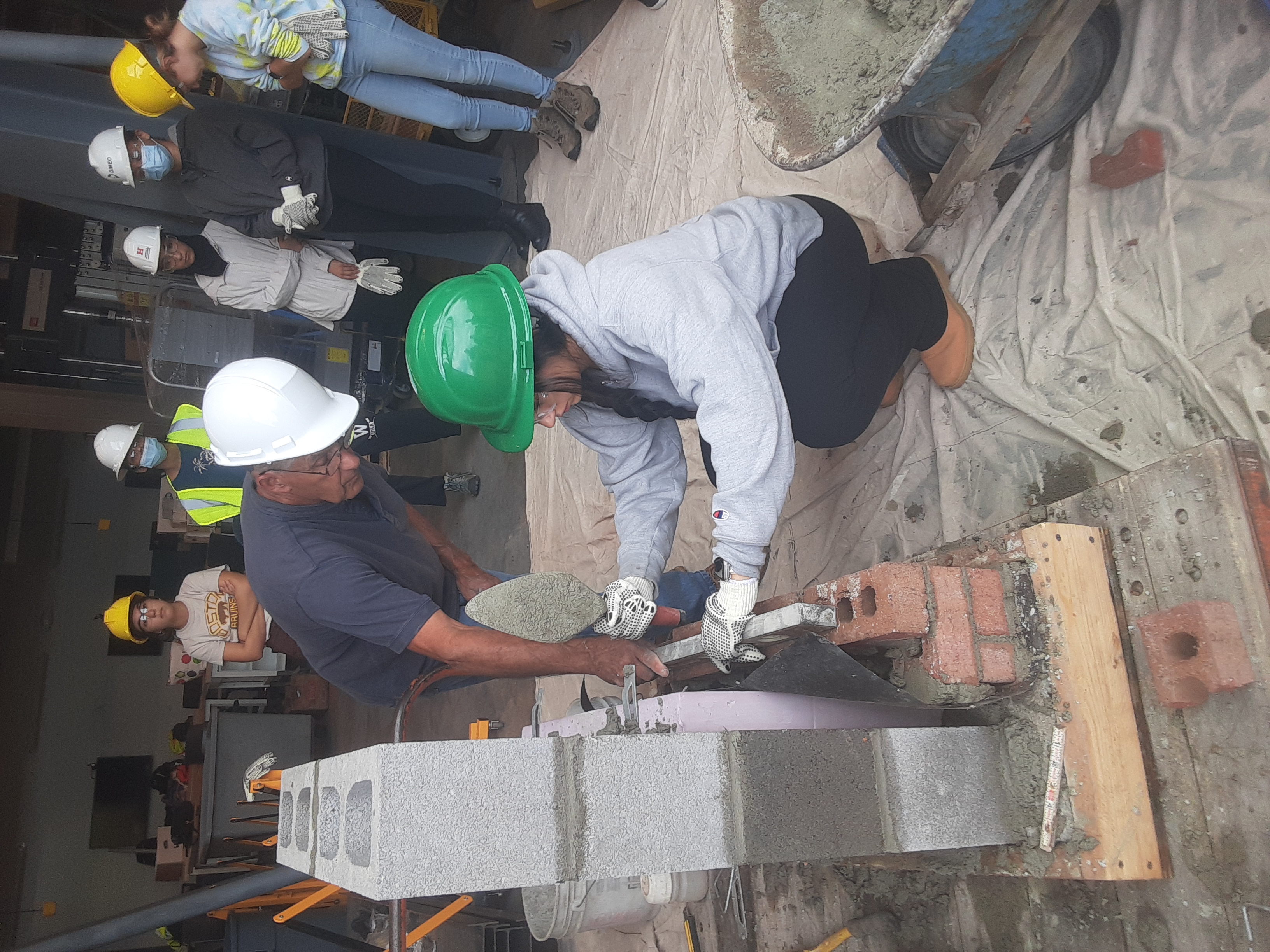 Materials & Methods of Construction Students Build a Brick Wall ...